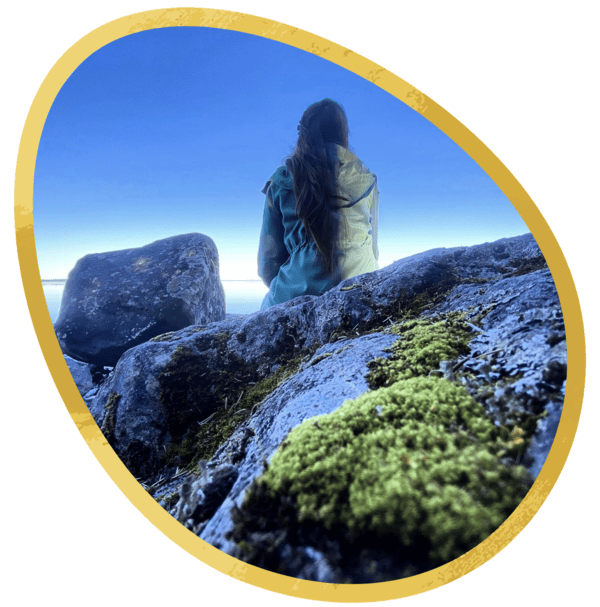LinTu.studio artist profile picture. An egg shaped image with rocks and LinTu herself